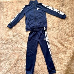 Nike boys track suit. Navy blue. Size 6.